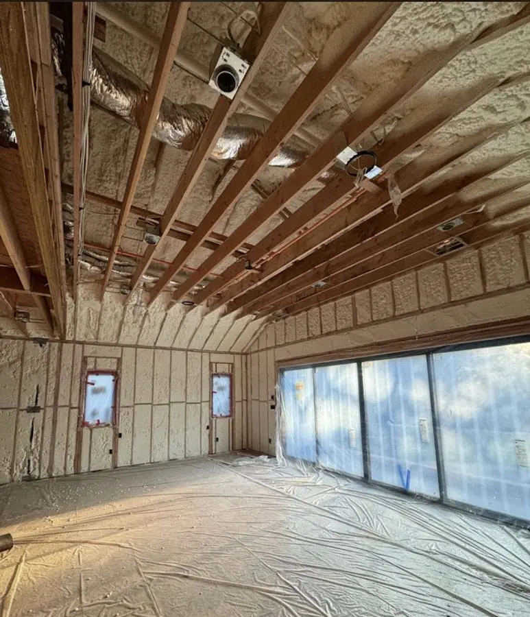 Interior walls and ceiling insulated with spray foam during new construction in Granby